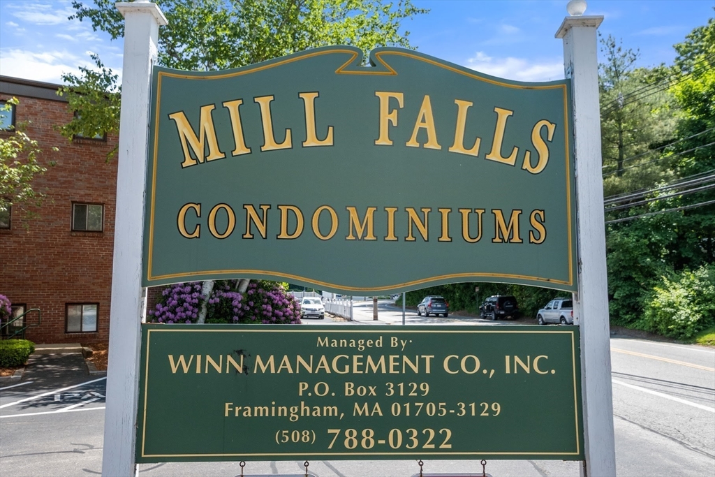 75 Nicholas Road, Unit K Framingham, MA 01701 - Photo 22 of 24 a sign that is on the wall of the building