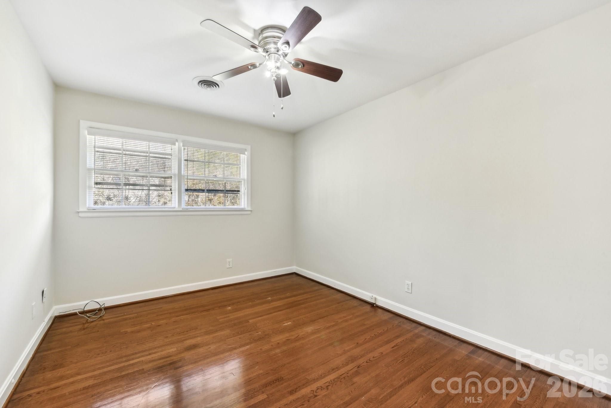 1334 Briar Creek Road, Unit 2 Charlotte, NC 28205 - Photo 11 of 30 an empty room with a window