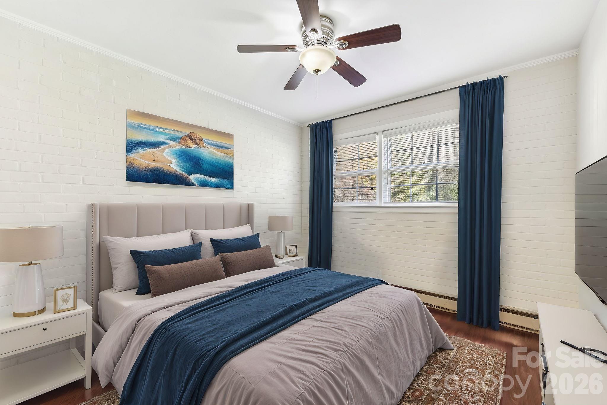 1334 Briar Creek Road, Unit 2 Charlotte, NC 28205 - Photo 23 of 30 a bedroom with bed and a window