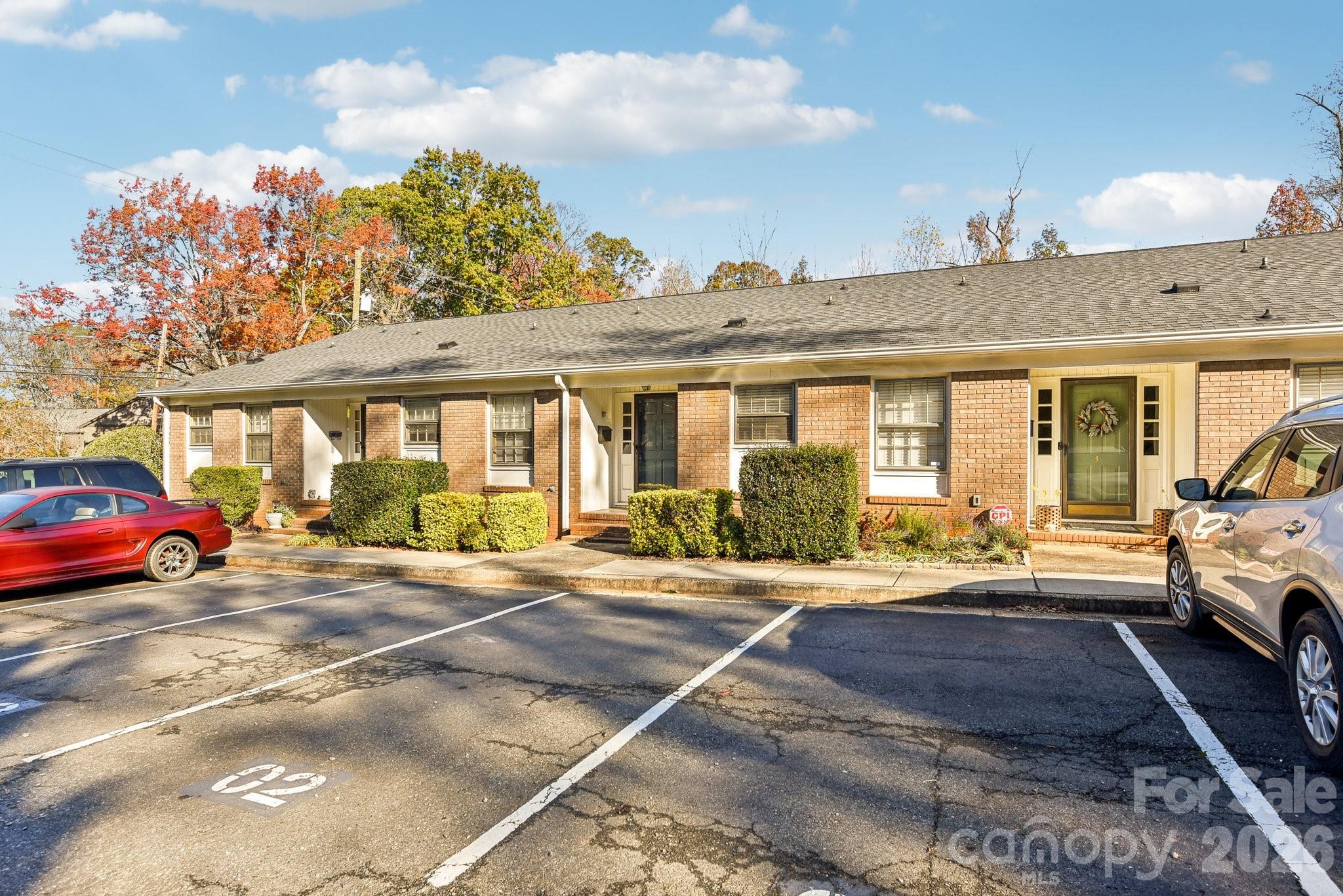 1334 Briar Creek Road, Unit 2 Charlotte, NC 28205 - Photo 30 of 30 a view of a house with car parked