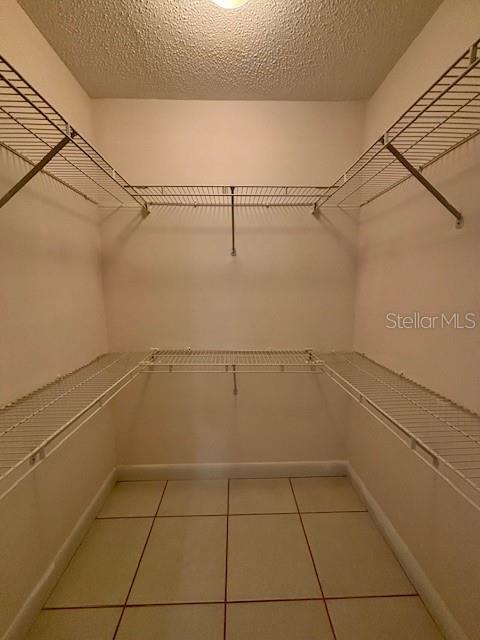 680 West Osceola Street, Unit 101 Clermont, FL 34711 - Photo 14 of 18 a view of a room with racks on the wall