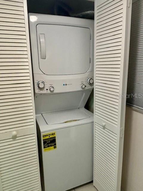 680 West Osceola Street, Unit 101 Clermont, FL 34711 - Photo 15 of 18 a utility room with dryer and washer