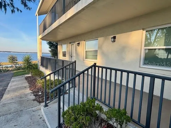 a view of balcony with furniture
