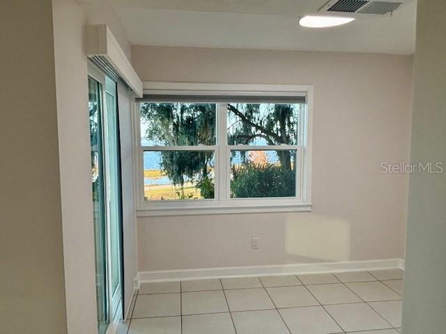 680 West Osceola Street, Unit 101 Clermont, FL 34711 - Photo 10 of 18 an empty room with a window