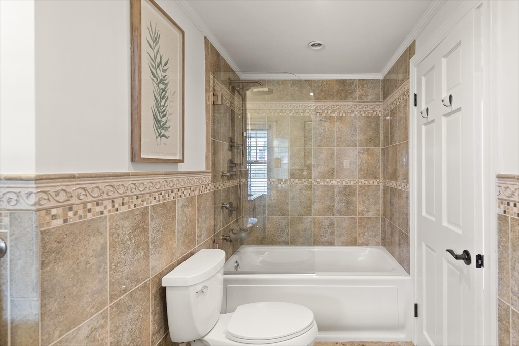 40 Friend Street Wakefield, MA 01880 - Photo 17 of 34 a bathroom with a toilet and a shower