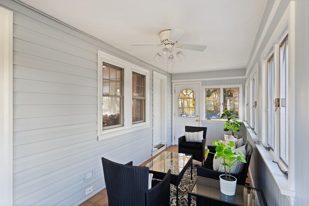 40 Friend Street Wakefield, MA 01880 - Photo 21 of 34 a dining room with furniture potted plants and wooden floor
