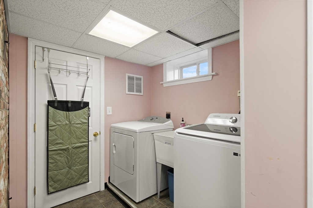 40 Friend Street Wakefield, MA 01880 - Photo 26 of 34 a utility room with dryer and washer