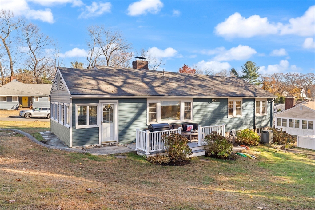40 Friend Street Wakefield, MA 01880 - Photo 31 of 34 a view of a house with a chairs in patio