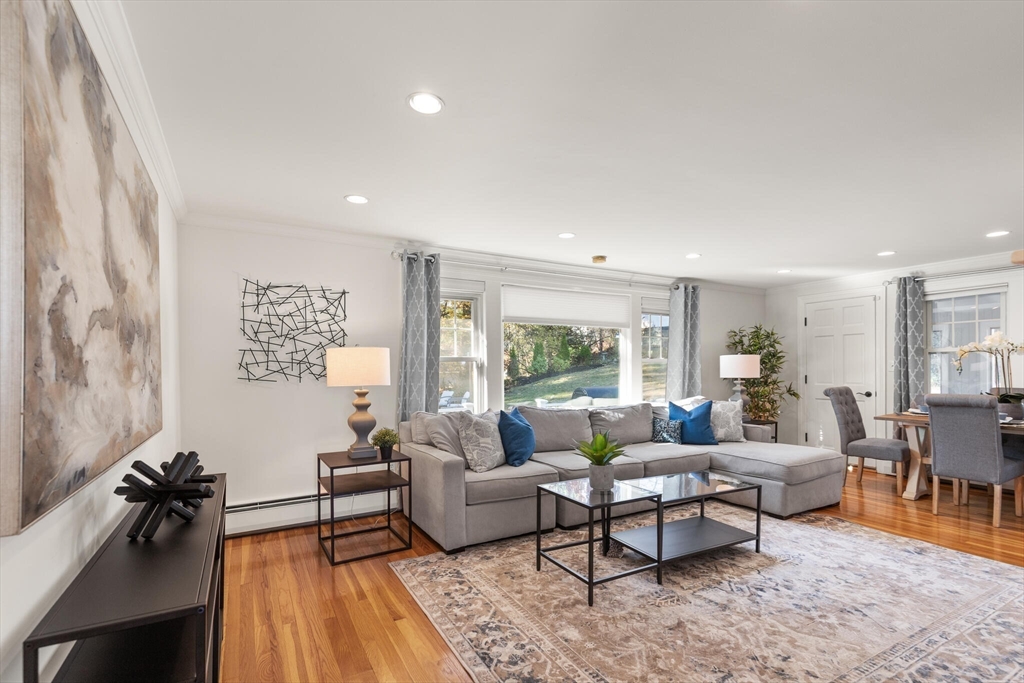40 Friend Street Wakefield, MA 01880 - Photo 5 of 34 a living room with furniture and a wooden floor