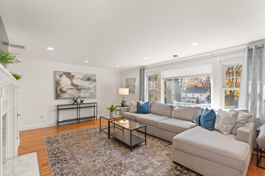 40 Friend Street Wakefield, MA 01880 - Photo 8 of 34 a living room with furniture and a rug