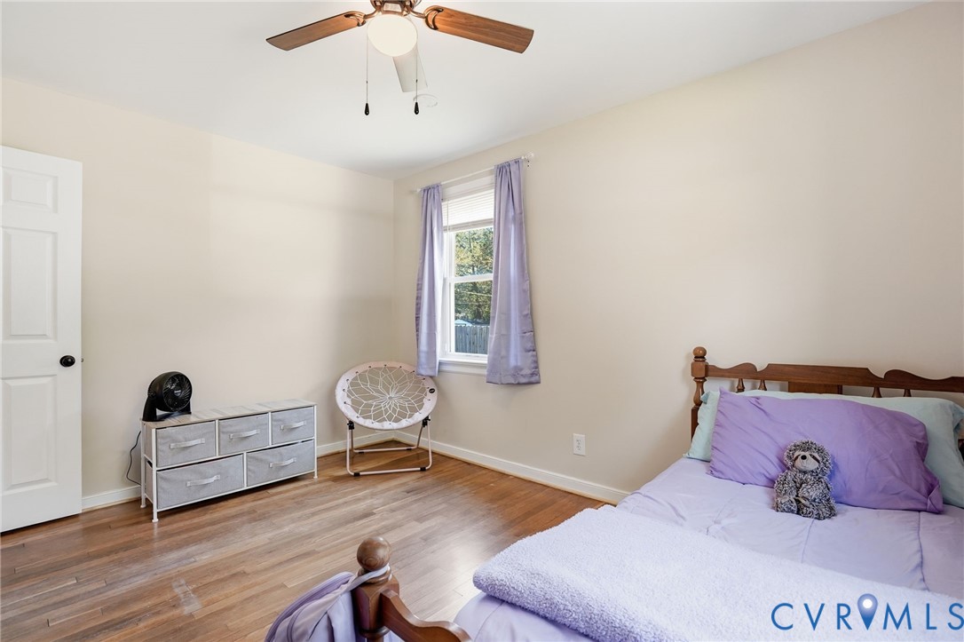 2403 Omega Road Henrico, VA 23228 - Photo 20 of 39 a bedroom with a bed and a window
