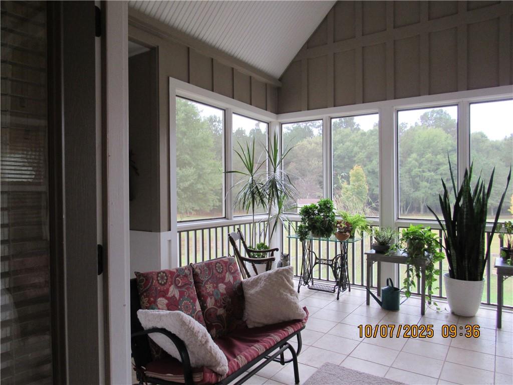 815 Spring View Court Covington, GA 30014 - Photo 18 of 43 a balcony with furniture and garden view