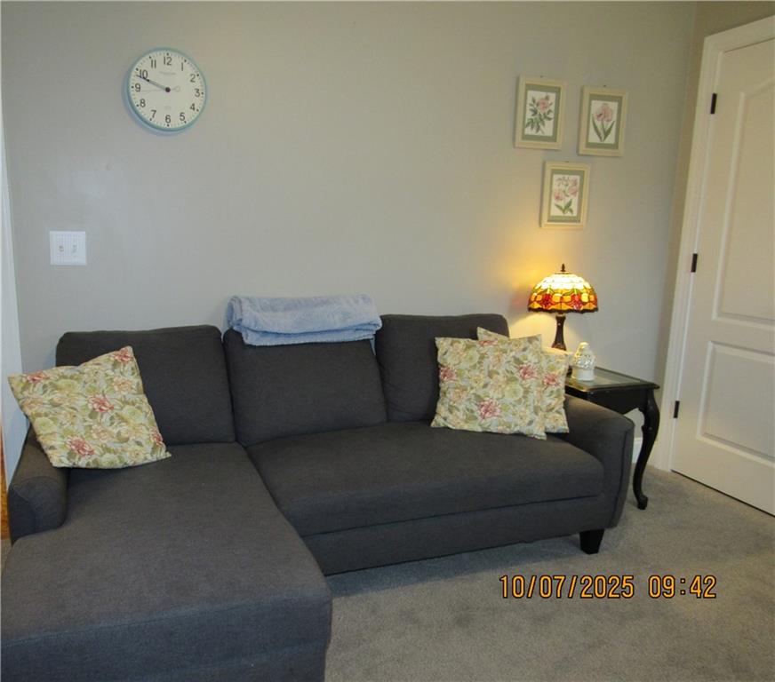815 Spring View Court Covington, GA 30014 - Photo 24 of 43 a living room with a couch
