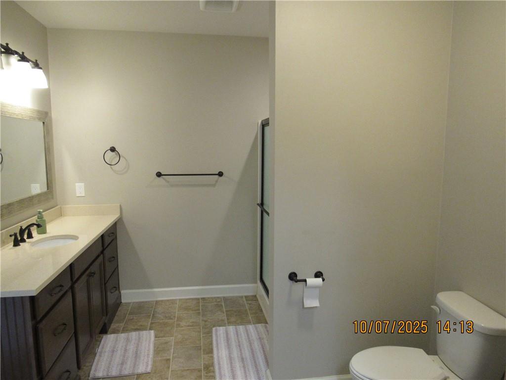 815 Spring View Court Covington, GA 30014 - Photo 29 of 43 a bathroom with a sink and toilet
