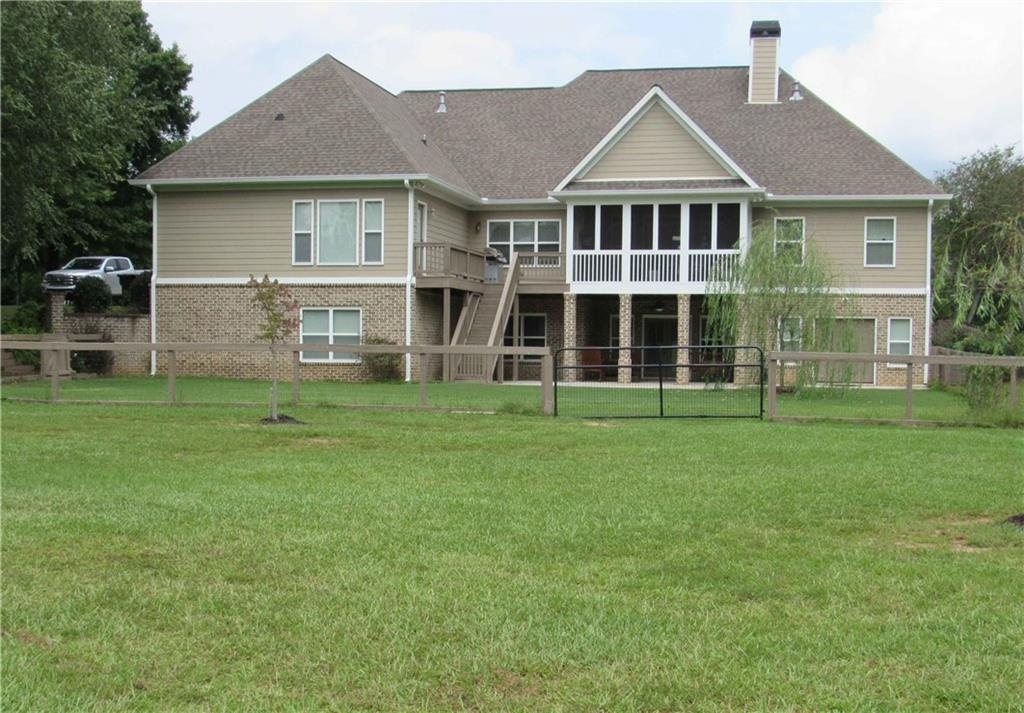 815 Spring View Court Covington, GA 30014 - Photo 42 of 43 a front view of a house with a yard
