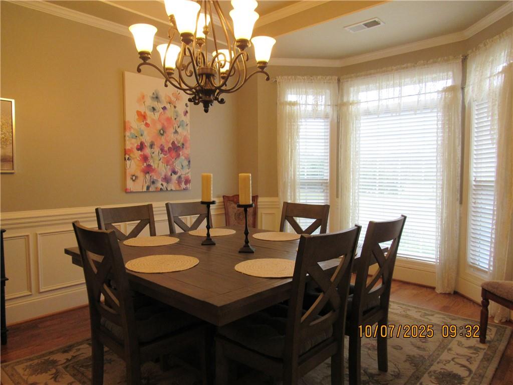 815 Spring View Court Covington, GA 30014 - Photo 7 of 43 a view of a dining room with furniture window and outside view