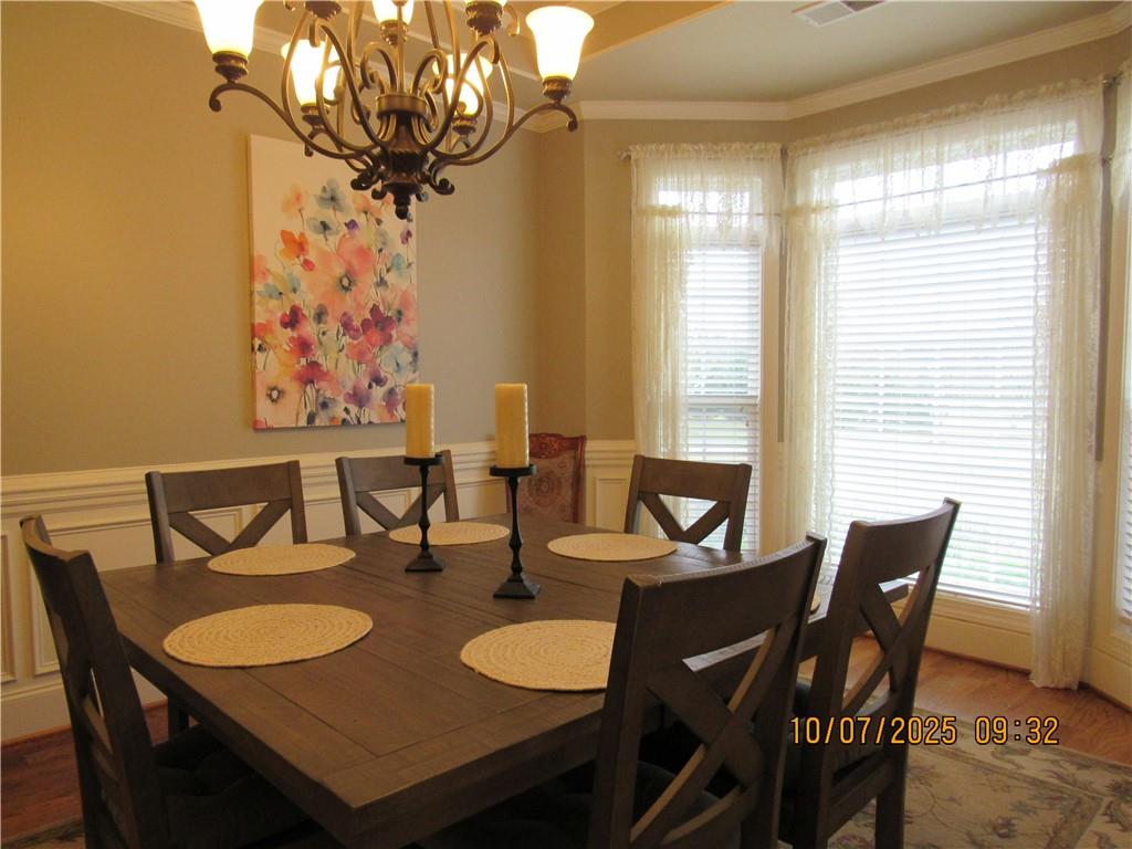 815 Spring View Court Covington, GA 30014 - Photo 9 of 43 a view of a dining room with furniture window and outside view
