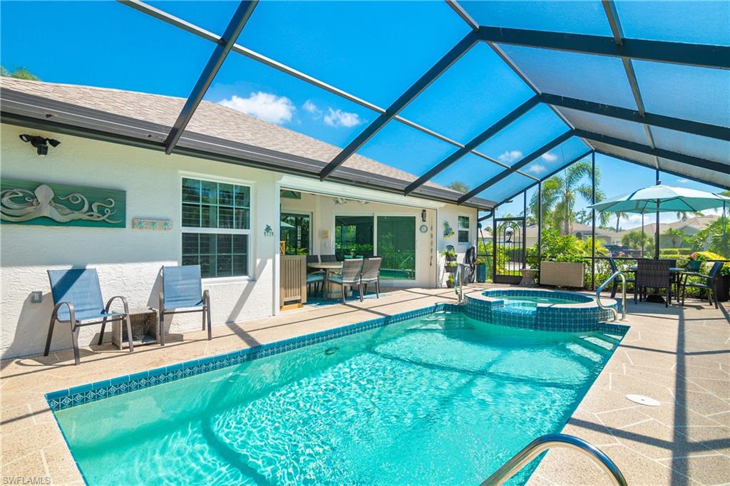20771 Persimmon Place Estero, FL 33928 - Photo 2 of 50 a view of a backyard with sitting area