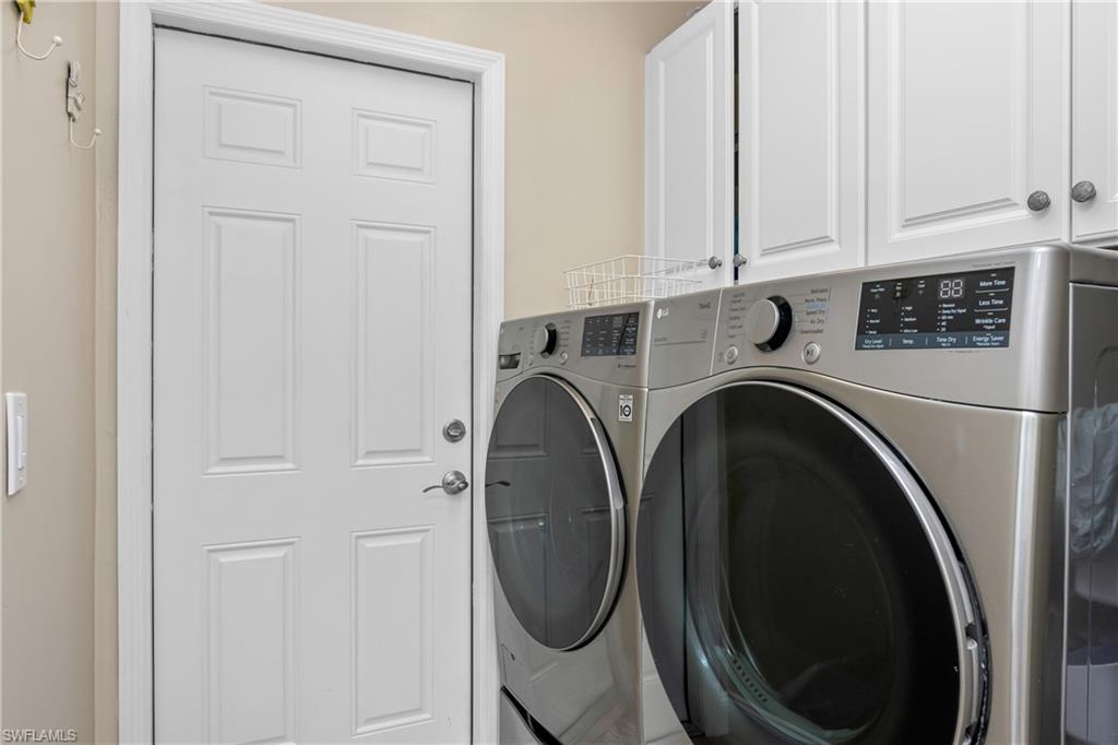 20771 Persimmon Place Estero, FL 33928 - Photo 26 of 50 a utility room with dryer and washer