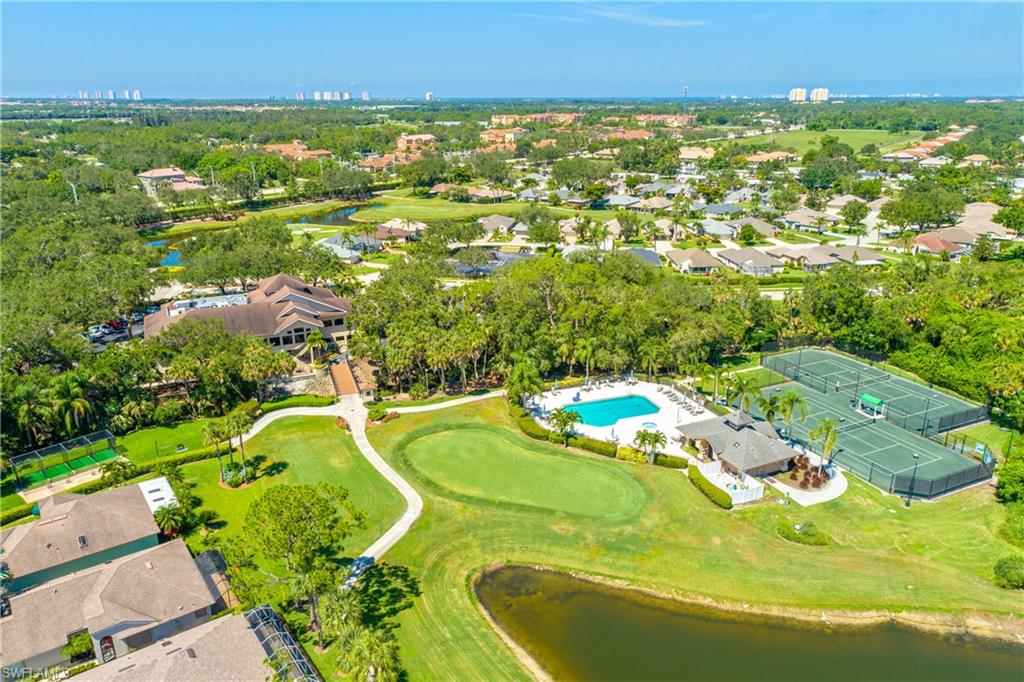 20771 Persimmon Place Estero, FL 33928 - Photo 33 of 50 an aerial view of residential houses with outdoor space and swimming pool