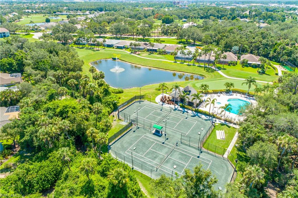 20771 Persimmon Place Estero, FL 33928 - Photo 34 of 50 an aerial view of a house with a swimming pool yard and outdoor seating