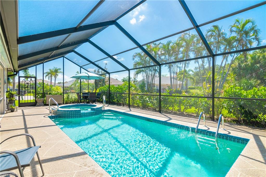 20771 Persimmon Place Estero, FL 33928 - Photo 4 of 50 a view of swimming pool with a patio
