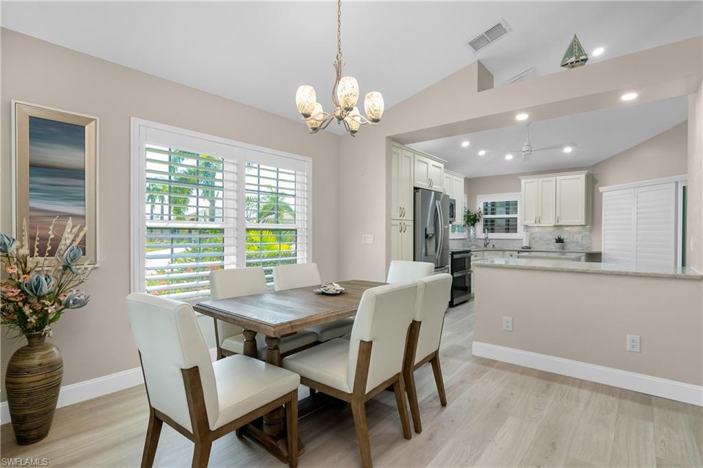 20771 Persimmon Place Estero, FL 33928 - Photo 8 of 50 a dining room with furniture and window