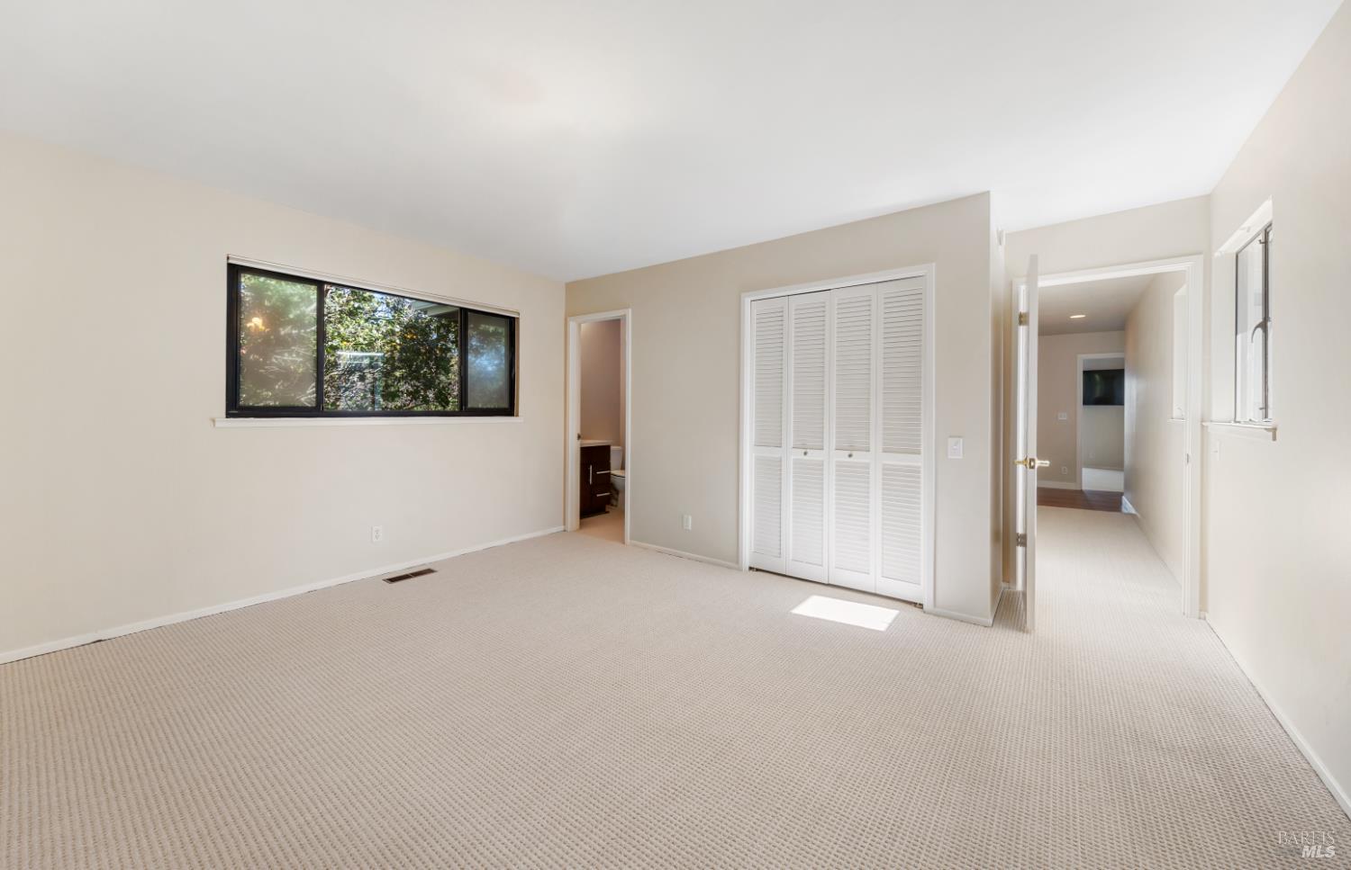 500 Ridge Road Tiburon, CA 94920 - Photo 28 of 42 an empty room with windows and closet