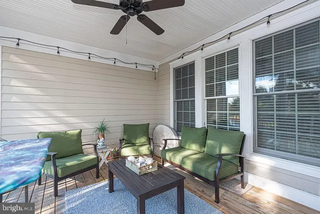 a outdoor living space with furniture and a window