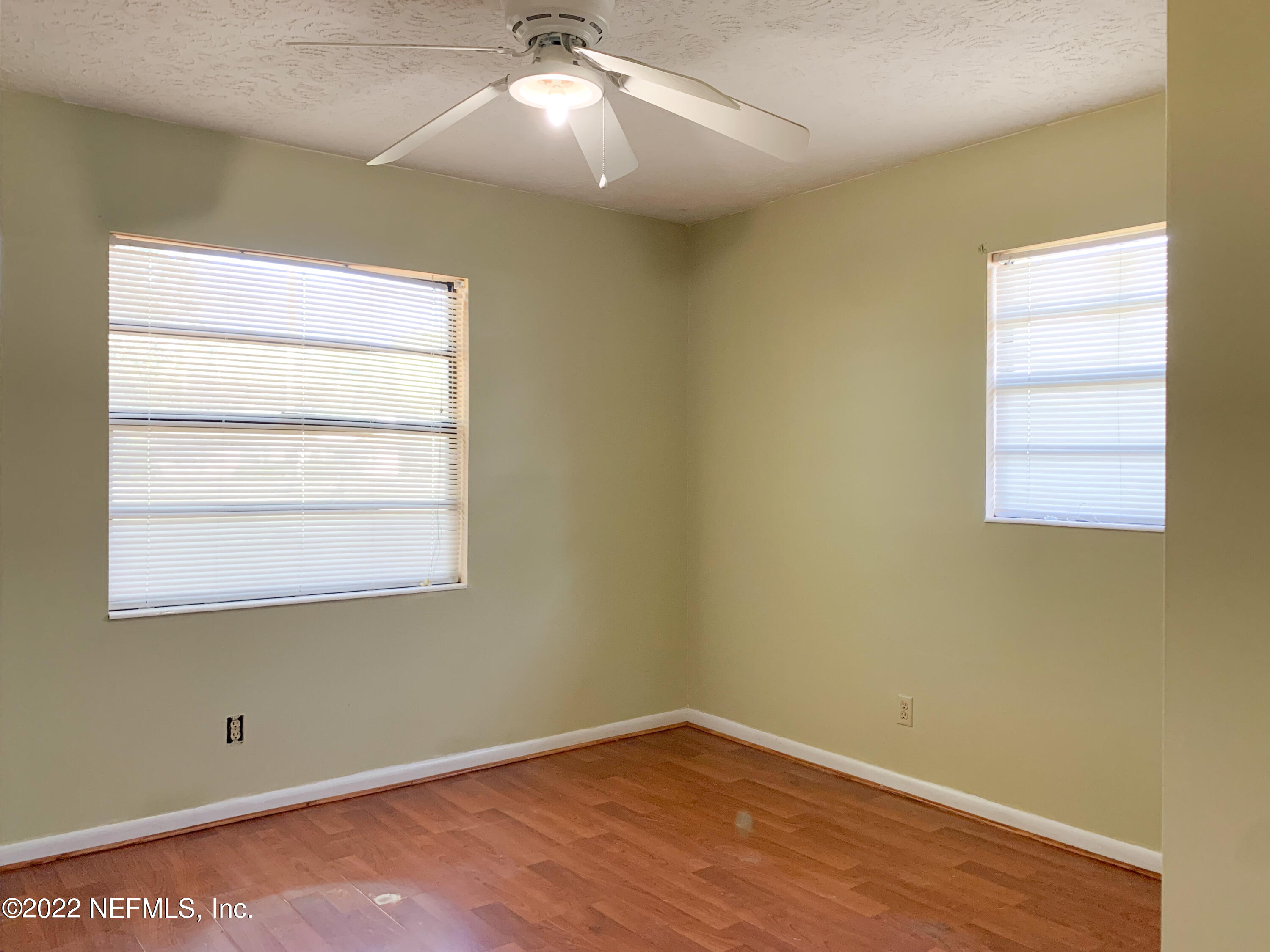 6771 Deer Springs Road Keystone Heights, FL 32656 - Photo 17 of 23 an empty room with a window
