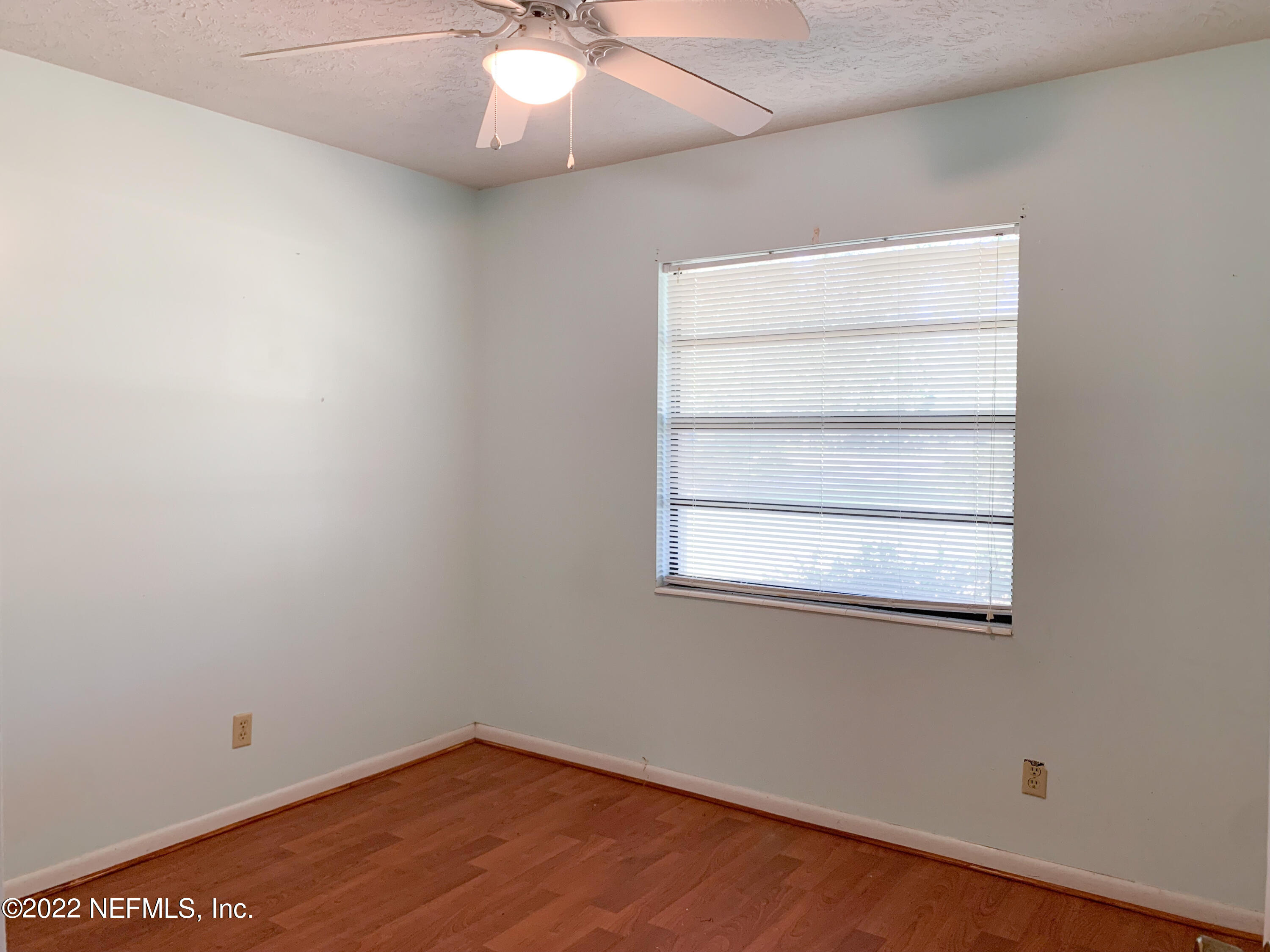 6771 Deer Springs Road Keystone Heights, FL 32656 - Photo 18 of 23 an empty room with a window