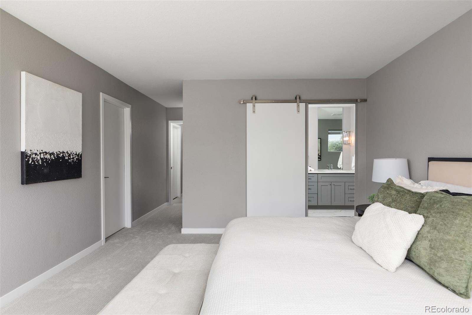 5230 Stuart Street Denver, CO 80212 - Photo 17 of 34 a bedroom with a bed and a window