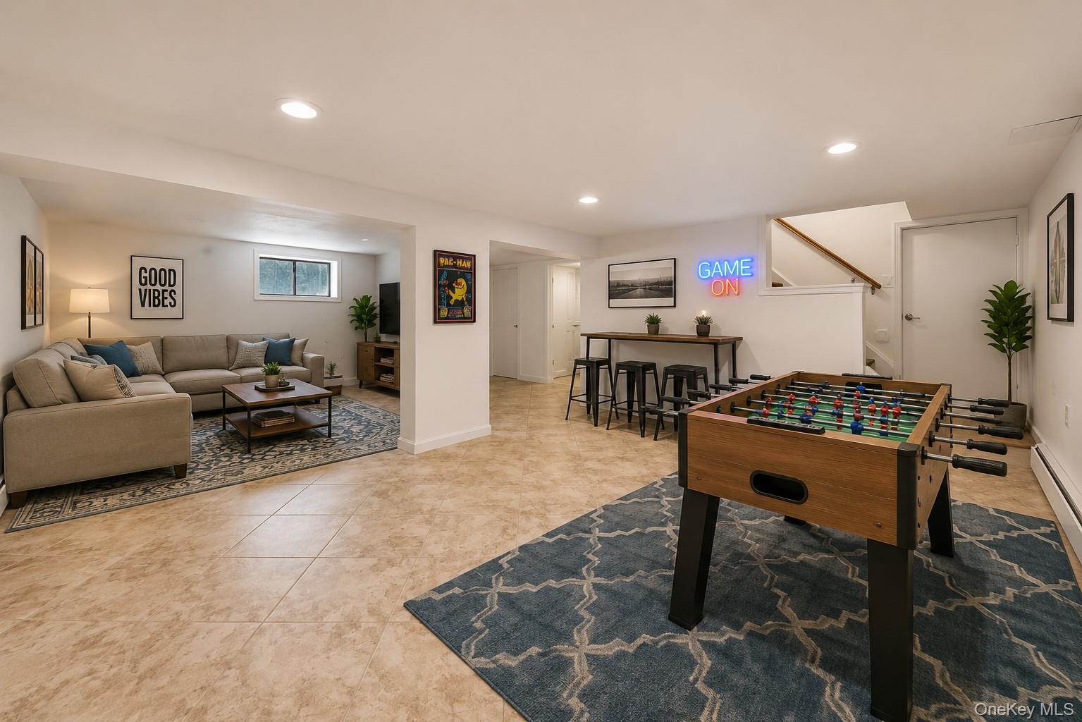 785 Locksley Road Yorktown Heights, NY 10598 - Photo 12 of 16 Finished lower level featuring recessed lighting, a window, tile flooring, and a built-in bar area photos have been digitally enhanced to illustrate the property's potential.