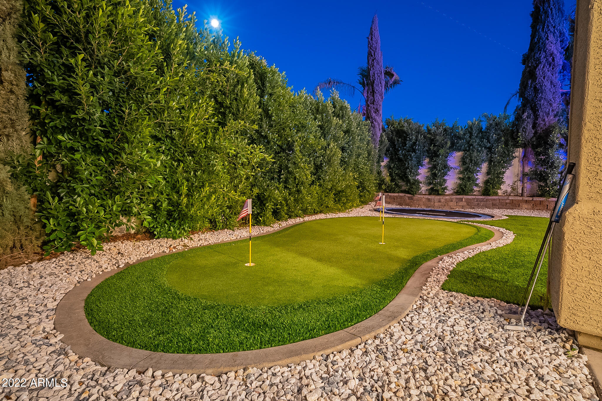 4611 East Desperado Road Gilbert, AZ 85297 - Photo 104 of 125 Nightime Putting with Privacy Ficus