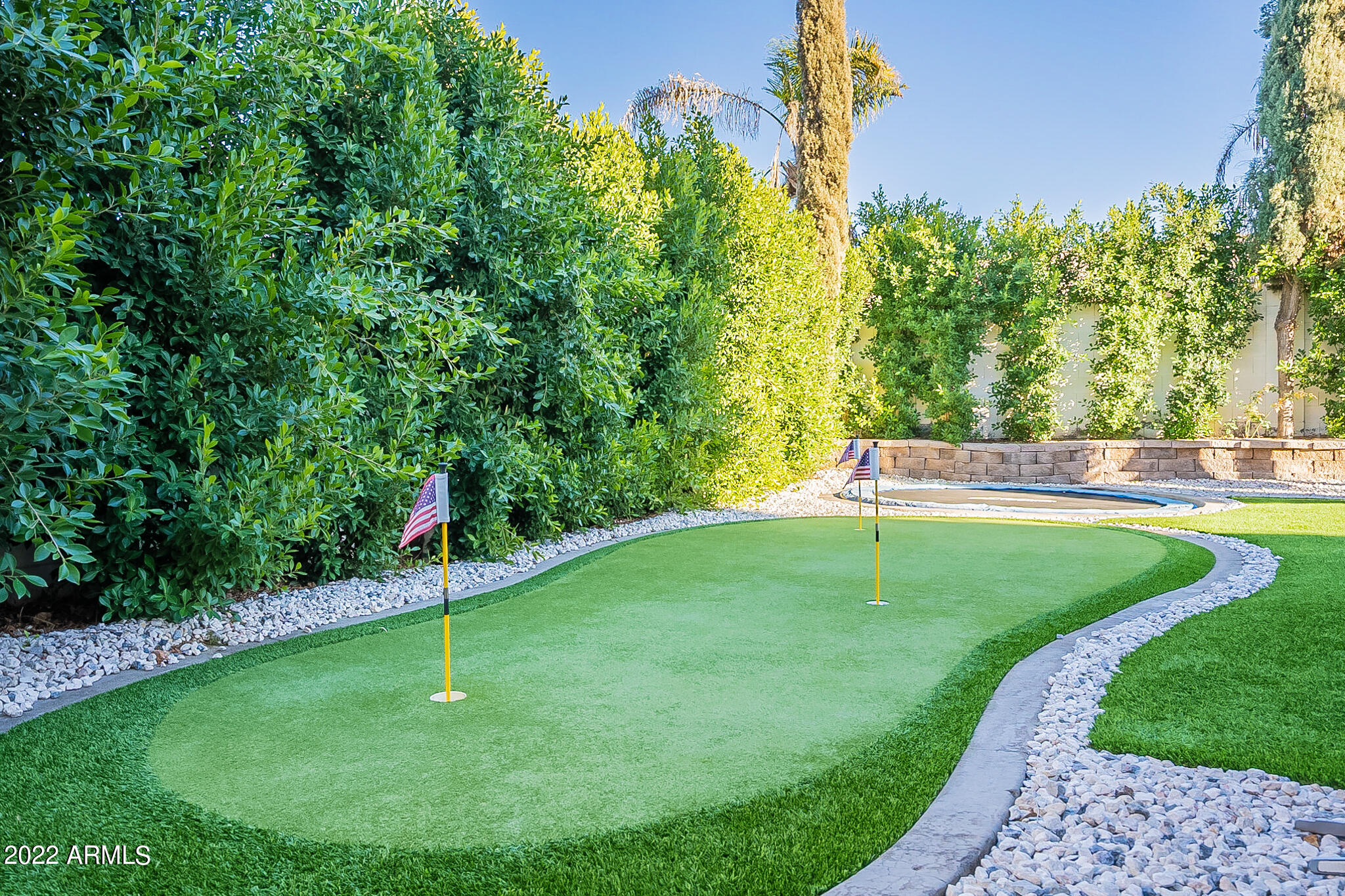 4611 East Desperado Road Gilbert, AZ 85297 - Photo 71 of 125 Outside Putting Green Showing Privacy Fi