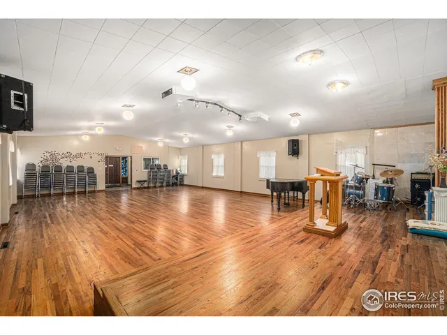 a view of a living room and kitchen