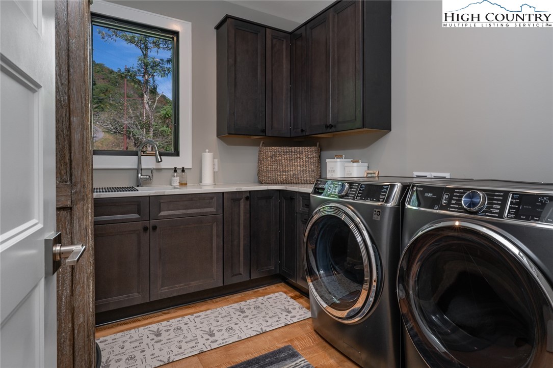 1180 Pinnacle Drive Boone, NC 28607 - Photo 23 of 50 a utility room with sink dryer and washer