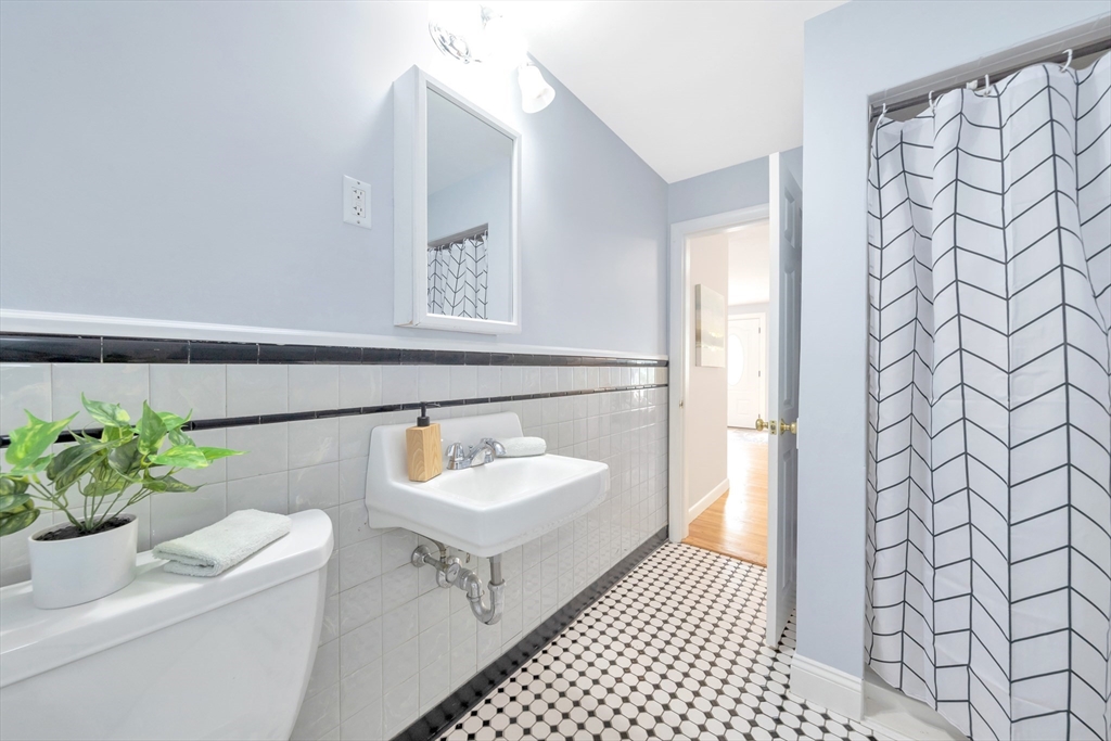 26 Andover Road Billerica, MA 01821 - Photo 14 of 40 a bathroom with a sink and a mirror