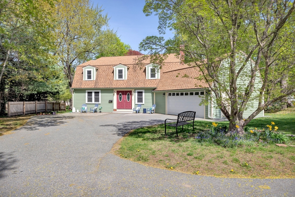 26 Andover Road Billerica, MA 01821 - Photo 2 of 40 a front view of a house with garden