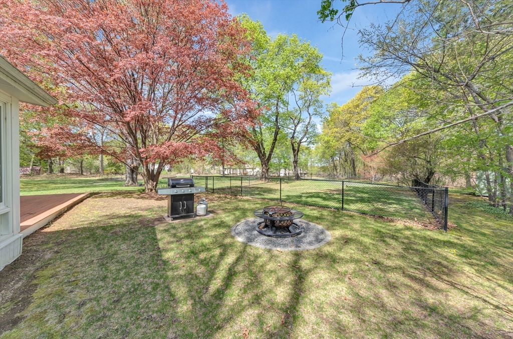 26 Andover Road Billerica, MA 01821 - Photo 4 of 40 a view of backyard with green space