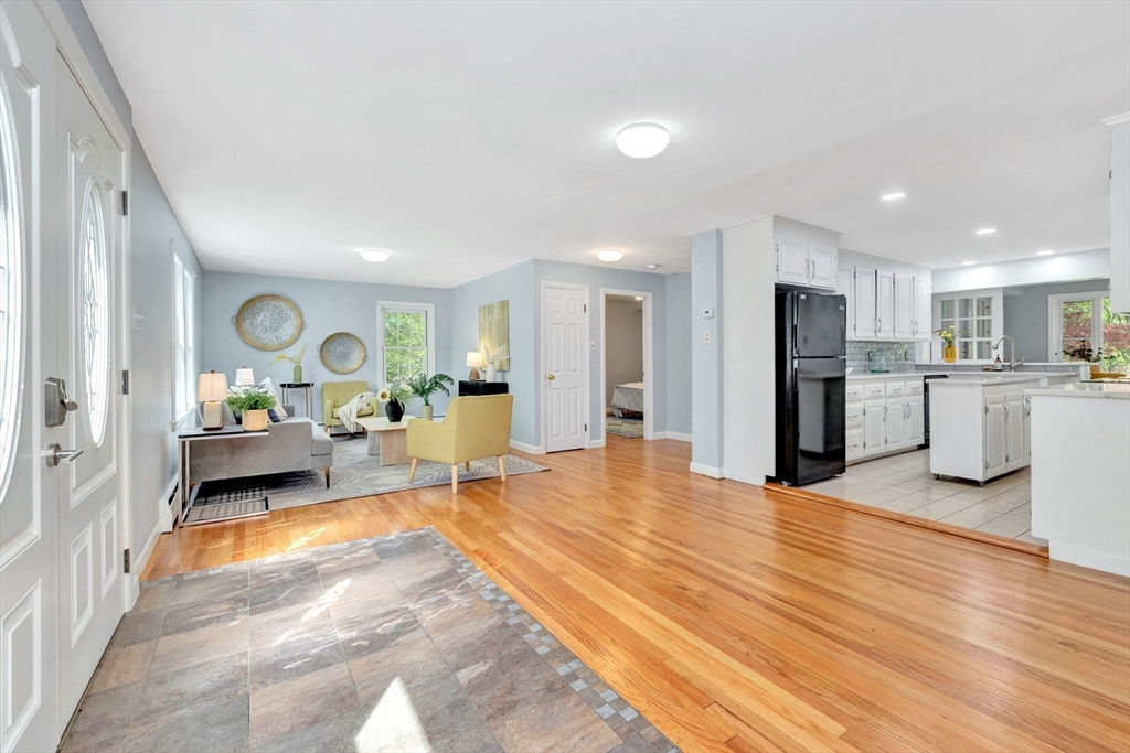 26 Andover Road Billerica, MA 01821 - Photo 10 of 40 a large room with stainless steel appliances kitchen island granite countertop a refrigerator and a sink