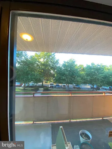 a view of a room with a large window