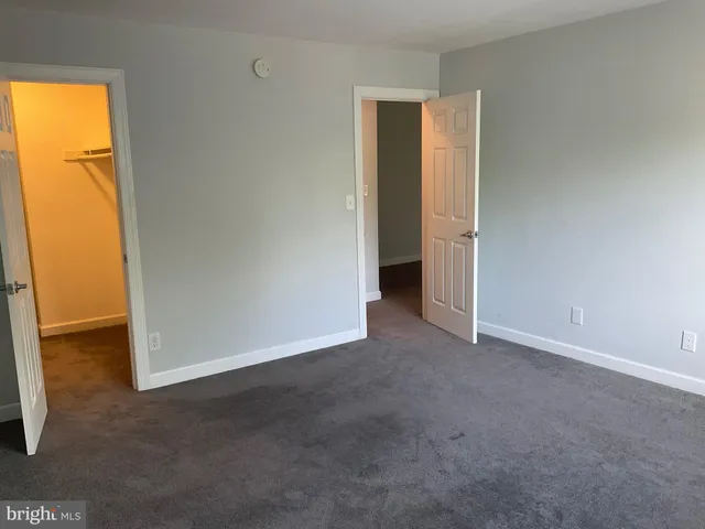 a view of an empty walk in closet