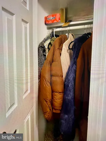 a close up view of a walk in closet