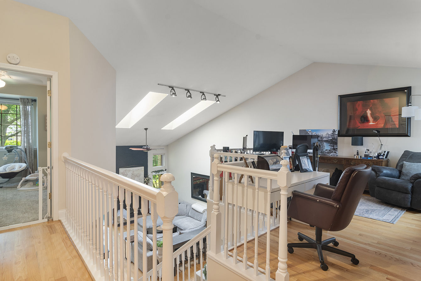 2833 Belle Lane, Unit 2833 Schaumburg, IL 60193 - Photo 15 of 23 a view of a livingroom with furniture hardwood floor and windows