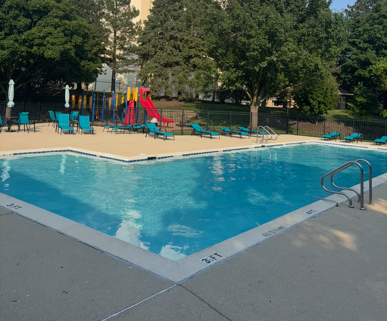 2833 Belle Lane, Unit 2833 Schaumburg, IL 60193 - Photo 20 of 23 a view of outdoor space swimming pool and green space