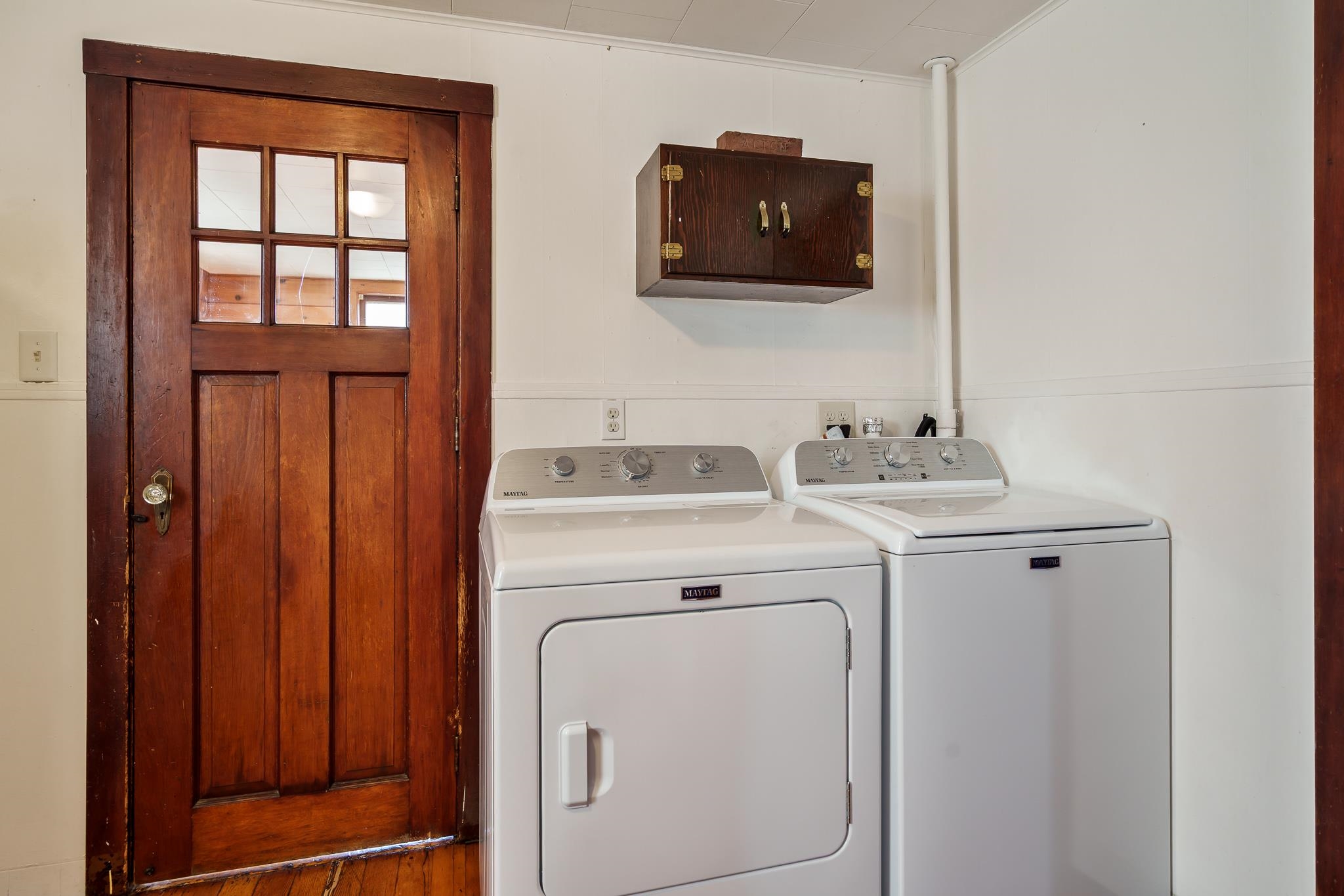 827 Sawyer Road Rockford, IL 61109 - Photo 13 of 24 a view of storage and utility room with wooden floor