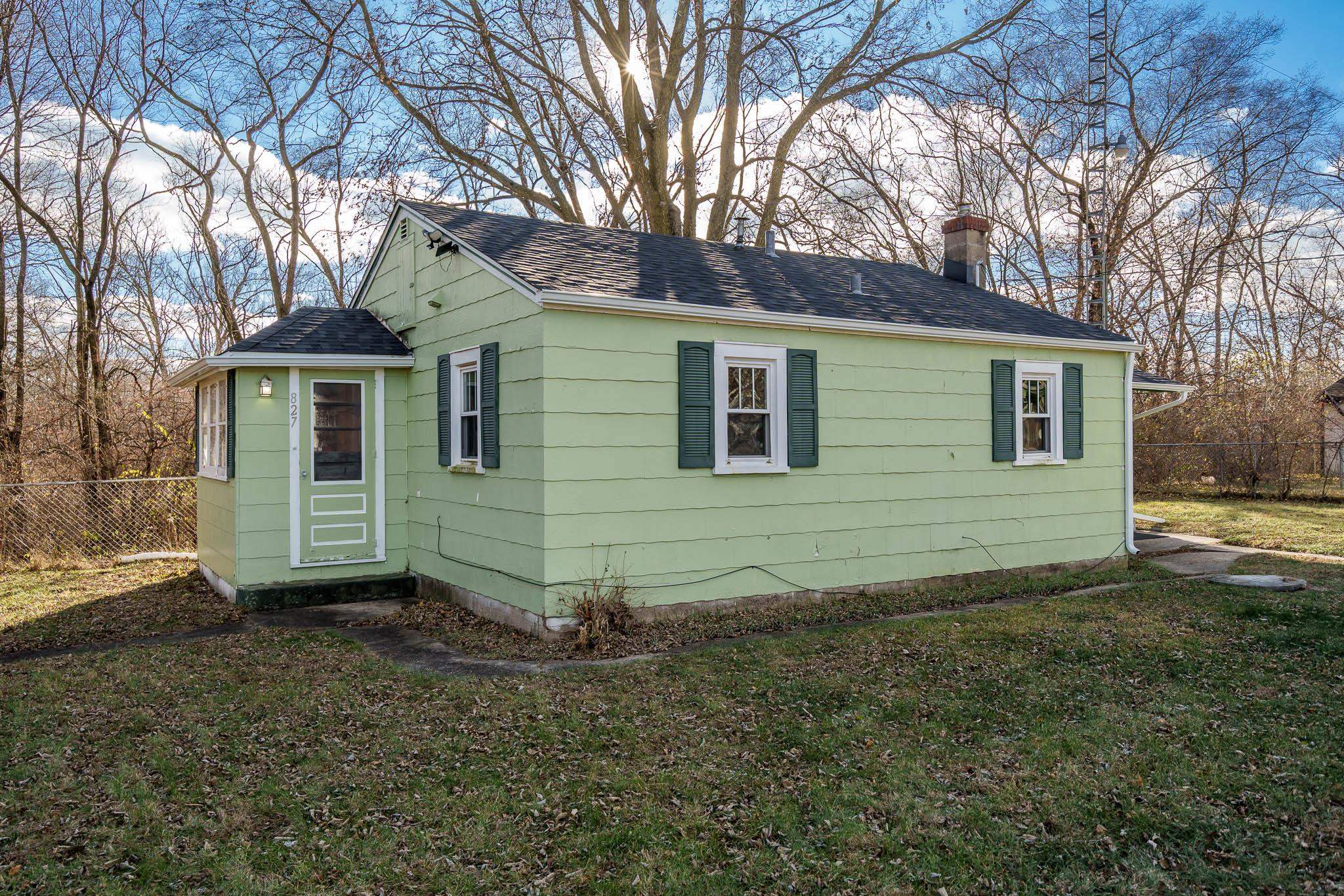 827 Sawyer Road Rockford, IL 61109 - Photo 20 of 24 a view of a house with a yard