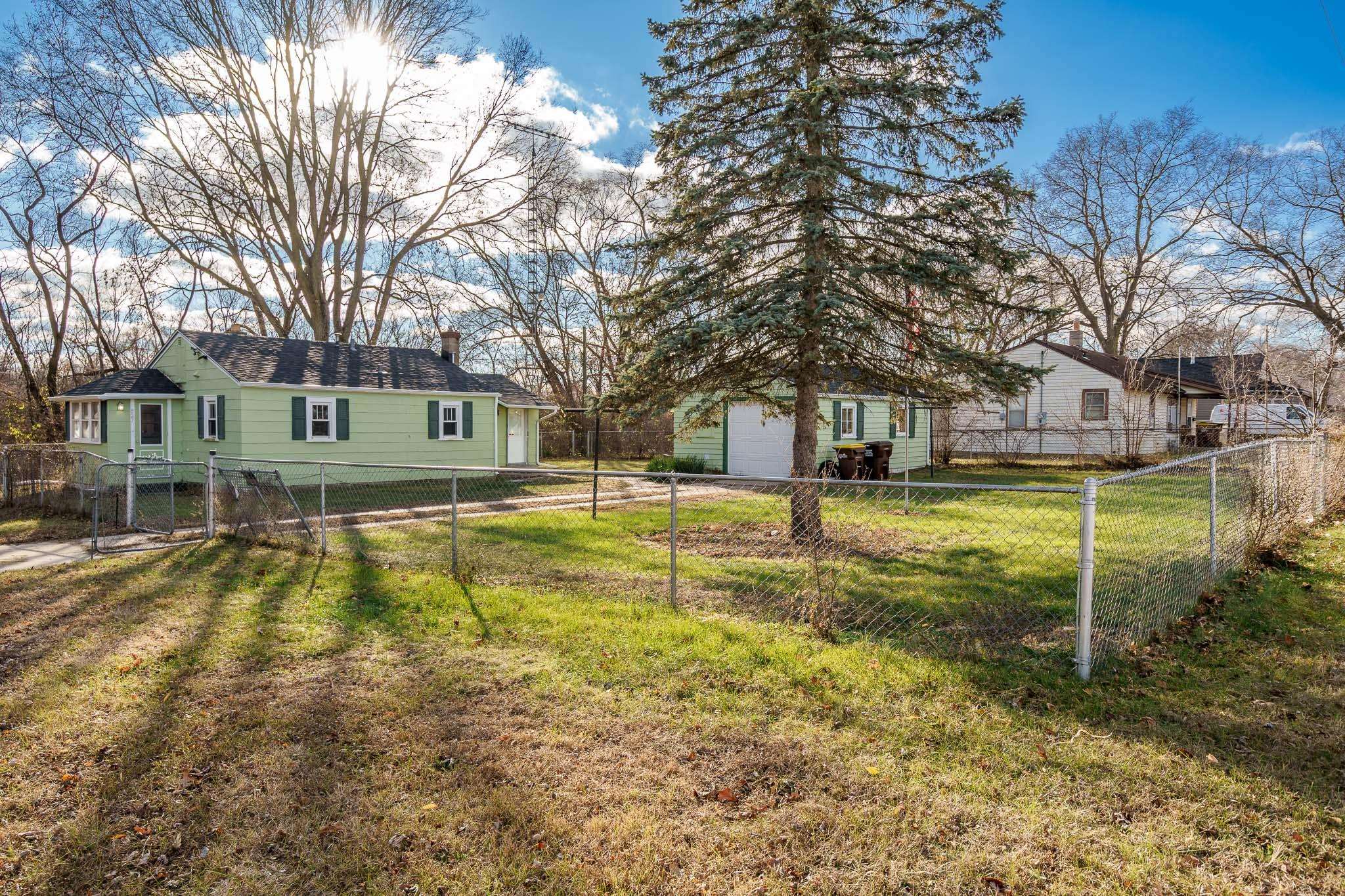 827 Sawyer Road Rockford, IL 61109 - Photo 2 of 24 a view of swimming pool with trees