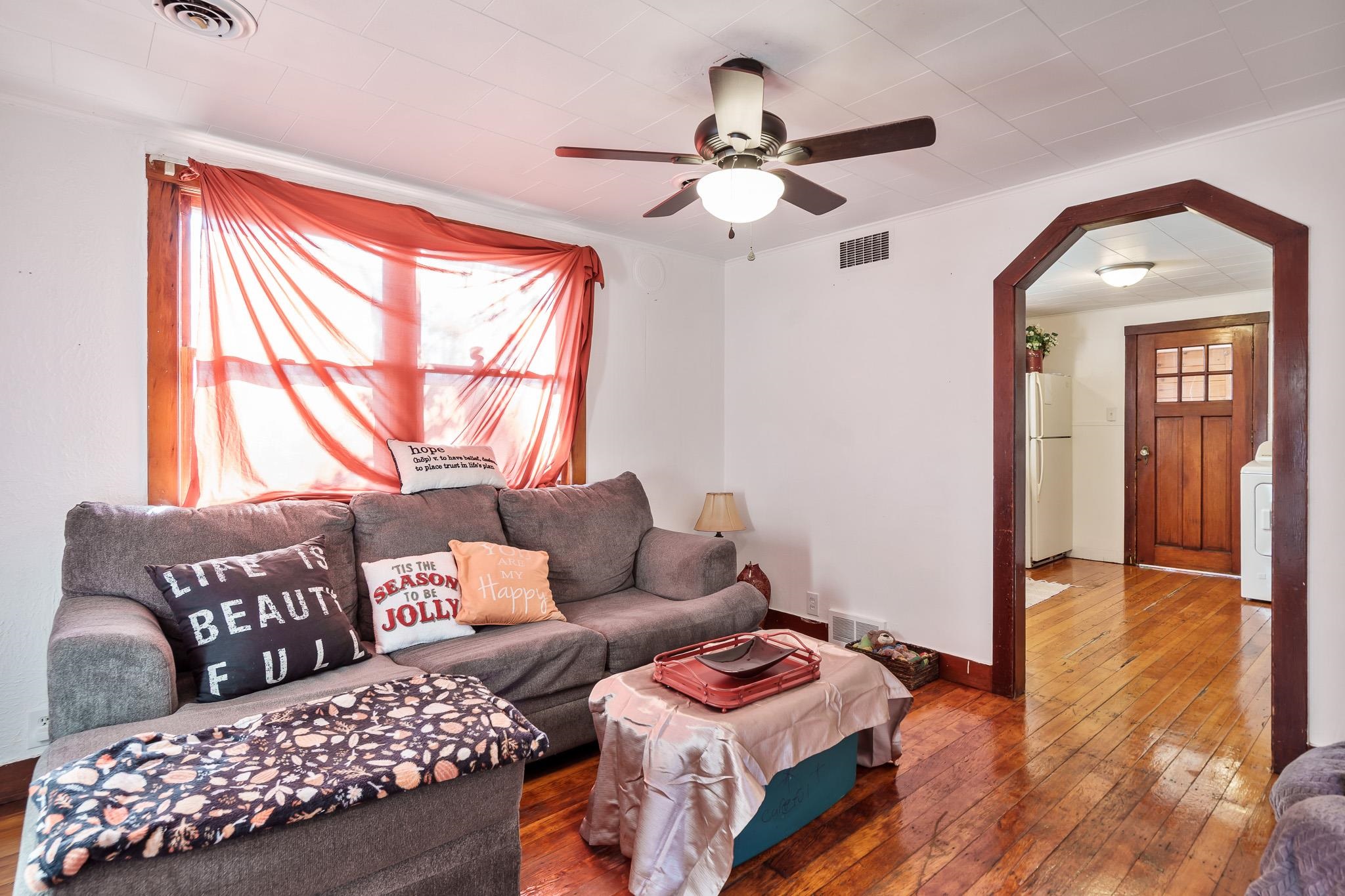 827 Sawyer Road Rockford, IL 61109 - Photo 4 of 24 a living room with furniture and a window